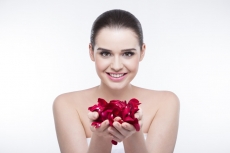 beautiful girl with rose petals 