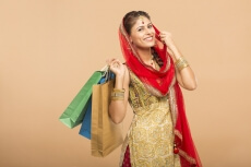 woman posing with shopping bags 