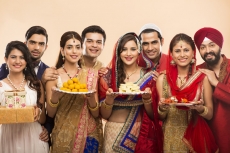 group of indian people welcoming