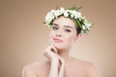 beautiful woman posing with flower crown 