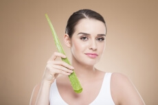 girl posing with aloe vera 