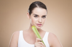 girl posing with aloe vera 