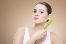 girl posing with aloe vera 
