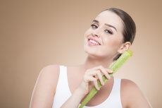 girl smiling and posing with aloe vera 