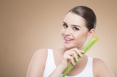 girl smiling and posing with aloe vera 