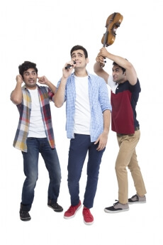 boys having fun while playing music