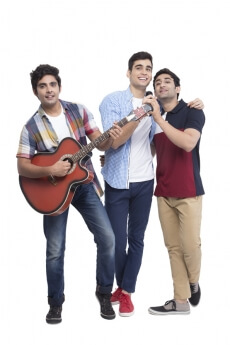 boys having fun while playing music