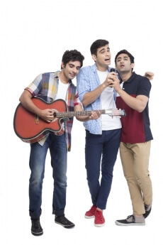 boys having fun while playing music