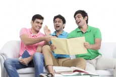 three friends laughing over joke