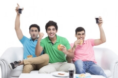 friends cheerful during cricket match
