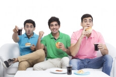 friends cheerful during cricket match