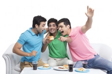 friends cheerful during cricket match