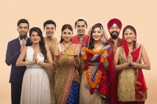 group of indian people welcoming