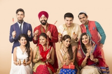 Indians posing with fire crackers 