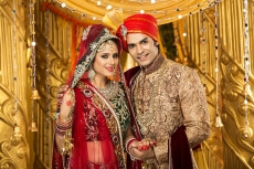 indian bride and groom posing 