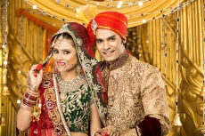 indian bride and groom posing 