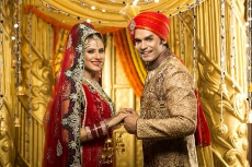 indian bride and groom posing 