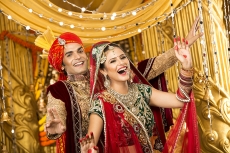 indian bride and groom dancing