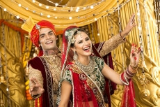 indian bride and groom dancing