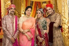 bride and groom with parents