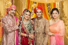 bride and groom with parents
