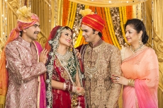 bride and groom with parents