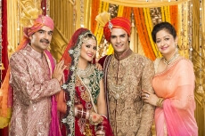 bride and groom with parents