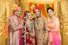 bride and groom with parents