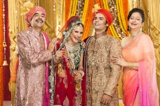 bride and groom with parents