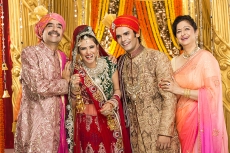 bride and groom with parents
