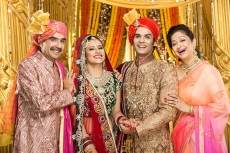 bride and groom with parents