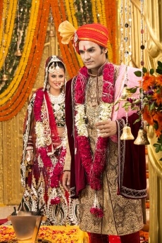 indian bride and groom taking pheras