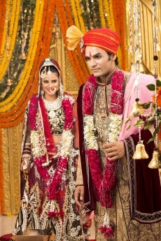 indian bride and groom taking pheras