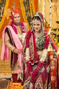 indian bride and groom taking pheras