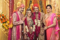 bride and groom with parents