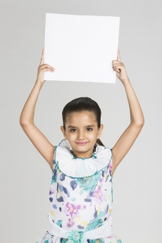 cute girl showing blank placard