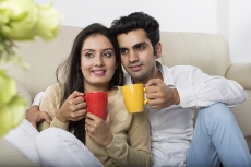 couple having coffee at home 