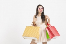 beautiful woman posing with shopping bags 