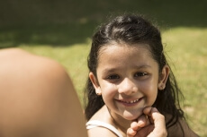 cute little girl smiling for the camera