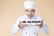 chef with cupcakes