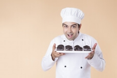 chef with cupcakes