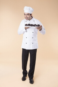chef with cupcakes