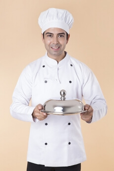 chef with serving tray