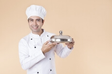 chef with serving tray