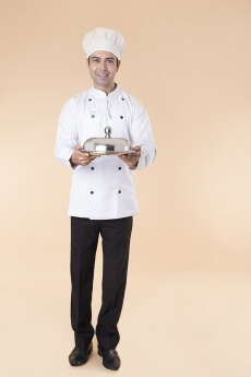 chef pointing towards something 