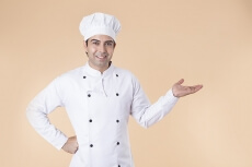 chef pointing towards something 