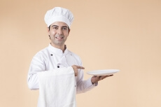 chef with serving plate 