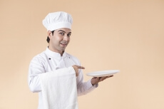 chef with serving plate 