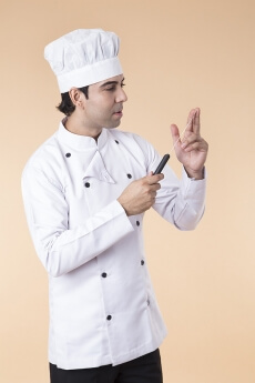chef with knife in hand