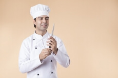 chef with knife in hand